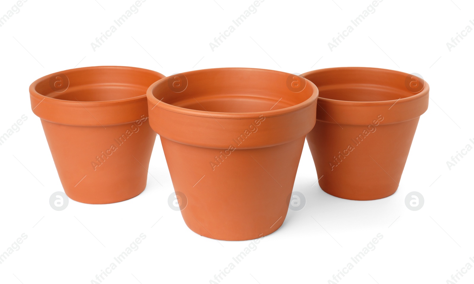 Photo of Empty clay flower pots isolated on white