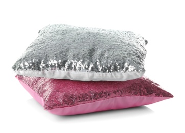 Photo of Shiny decorative pillows on white background