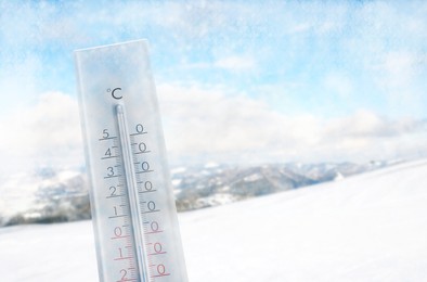 Thermometer showing temperature below zero outdoors on winter day