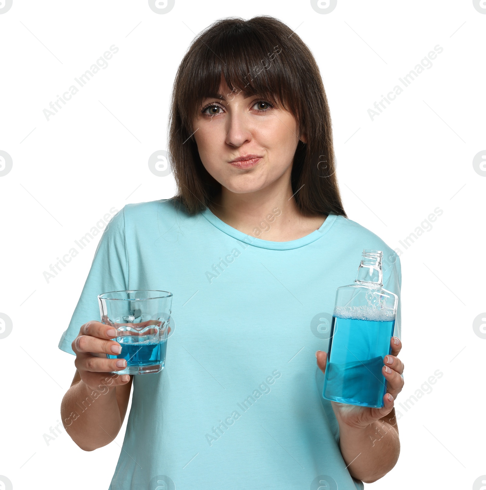 Photo of Young woman using mouthwash on white background