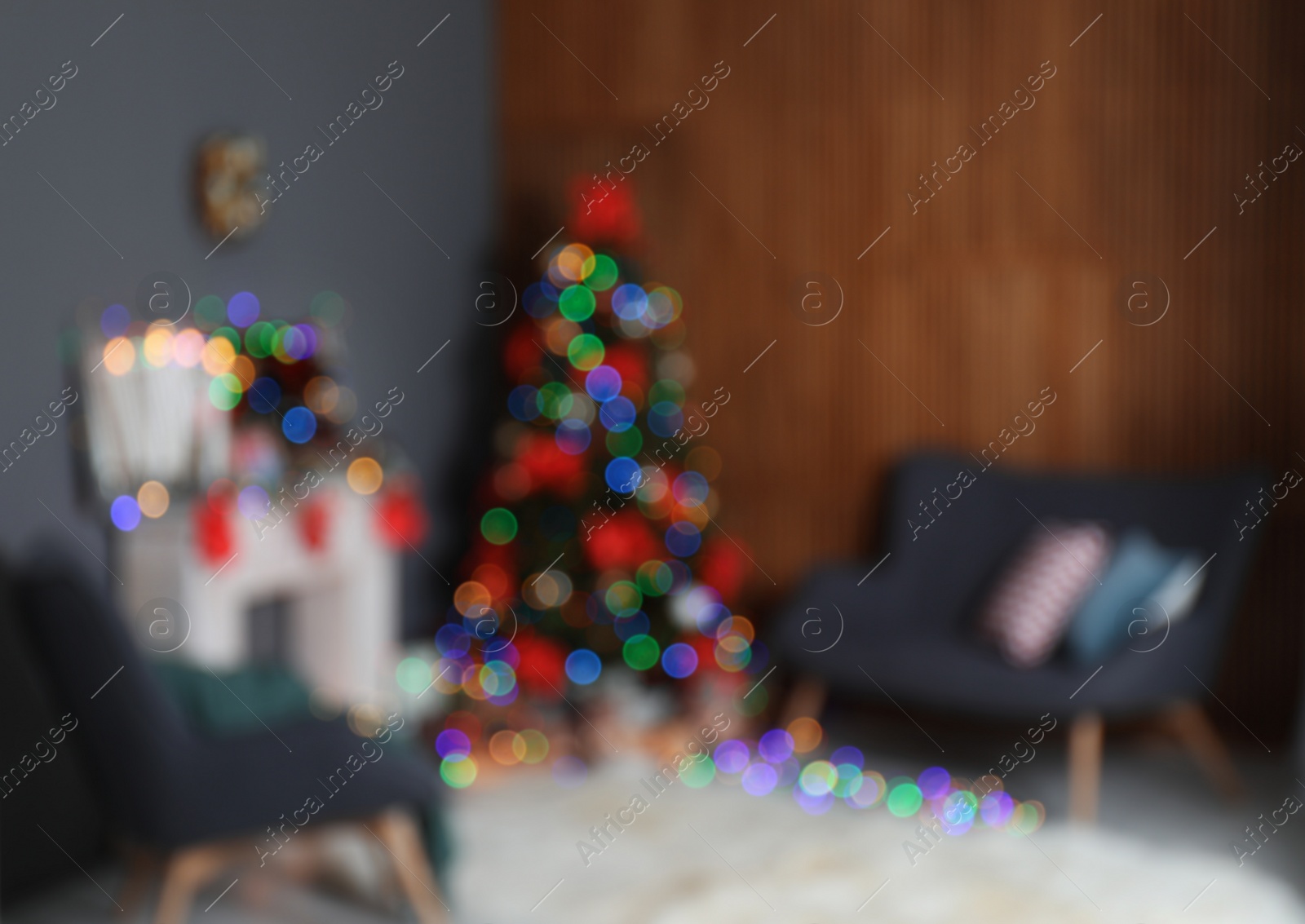 Photo of Blurred view of stylish living room interior with decorated Christmas tree