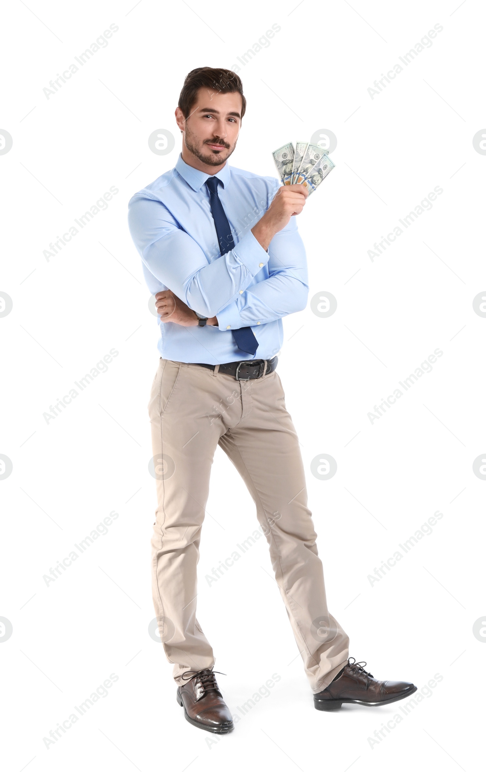 Photo of Handsome businessman with dollars on white background