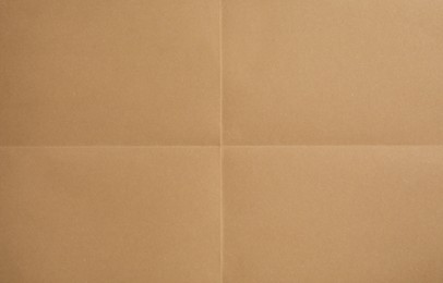 Photo of Texture of brown paper as background, closeup
