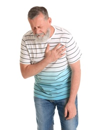 Mature man having heart attack on white background