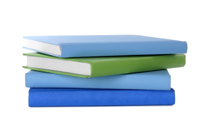 Stack of colorful books on white background