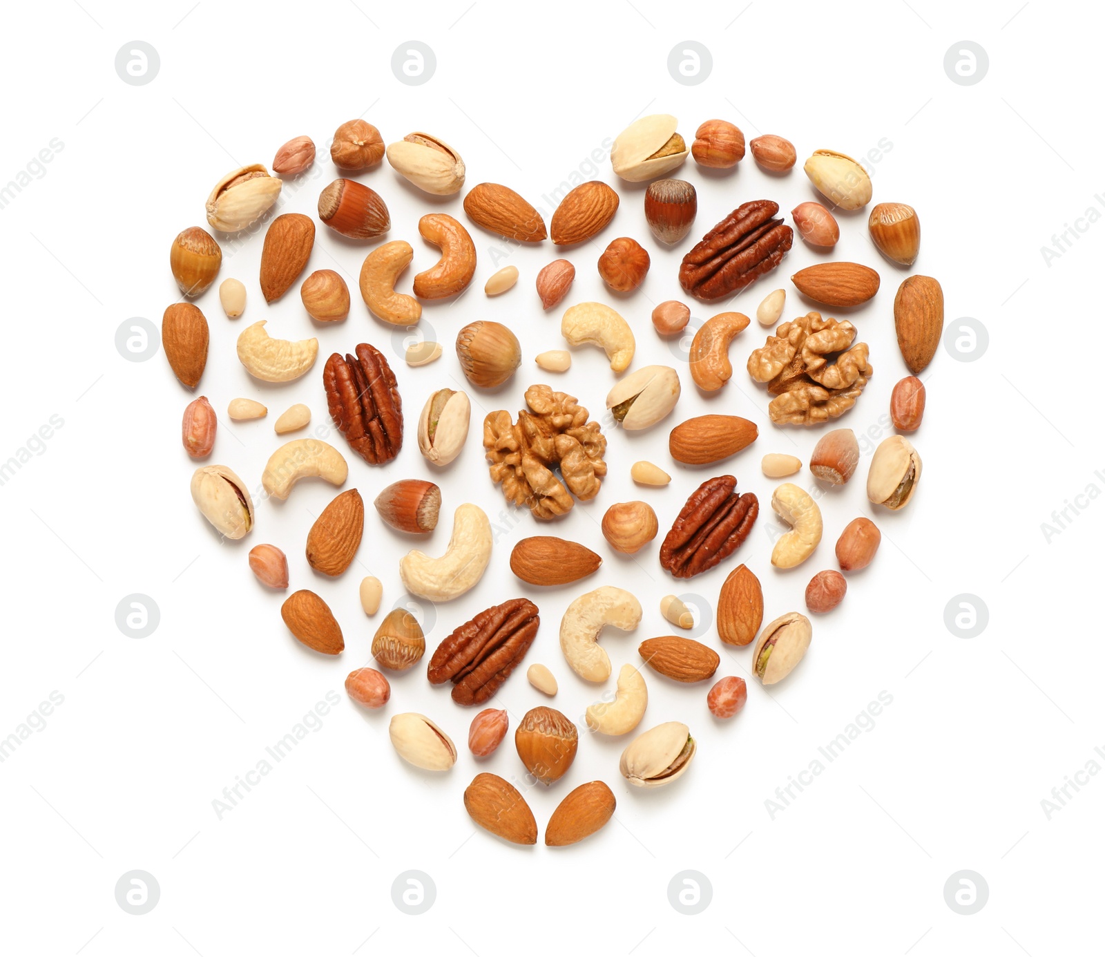 Photo of Heart made of different nuts on white background, flat lay