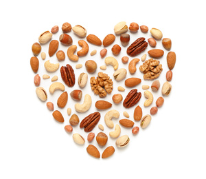 Heart made of different nuts on white background, flat lay