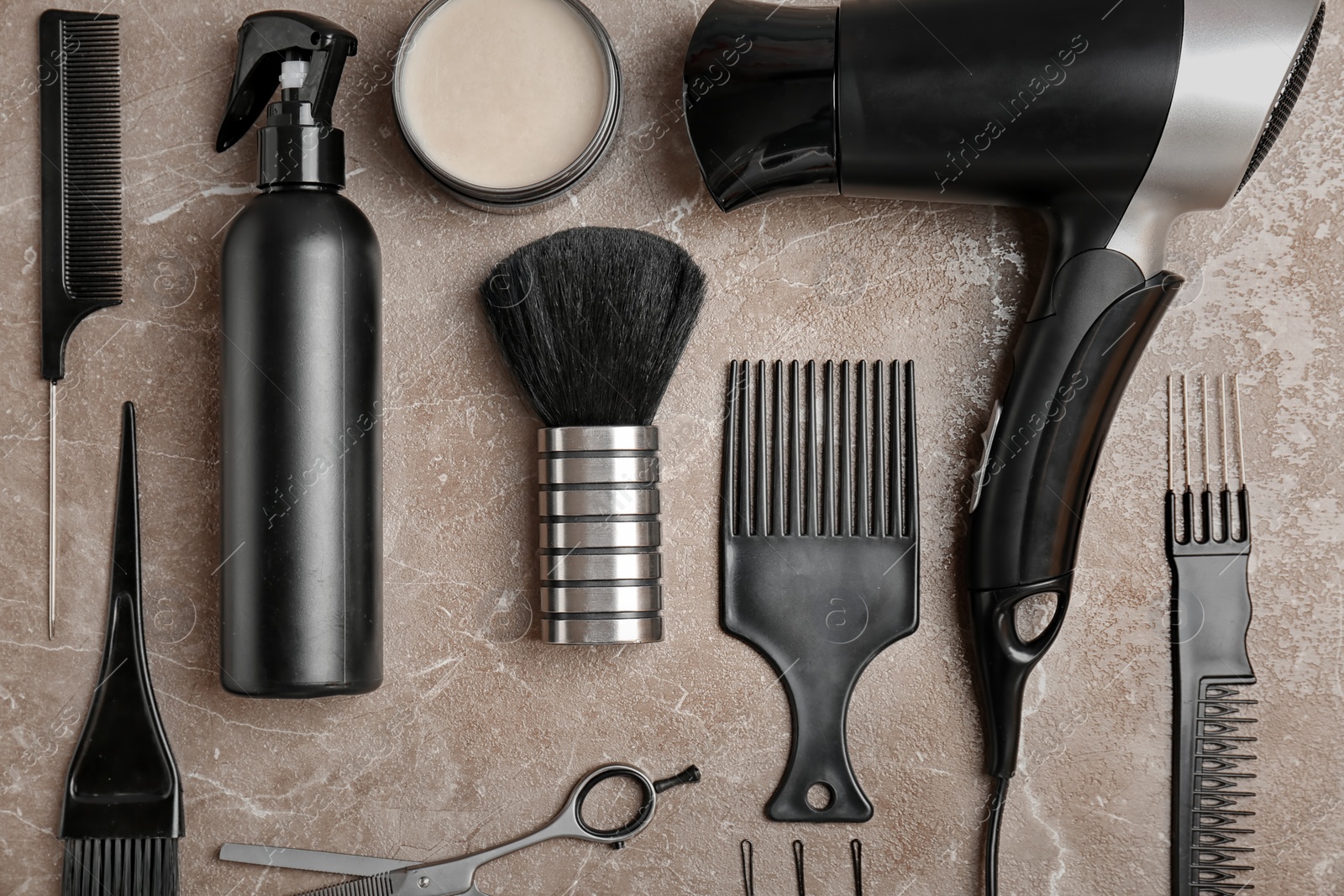 Photo of Flat lay composition with professional hairdresser tools on color background