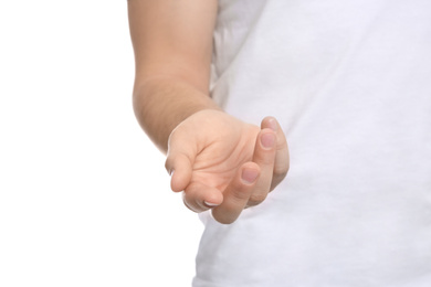 Photo of Man extending hand on white background, closeup