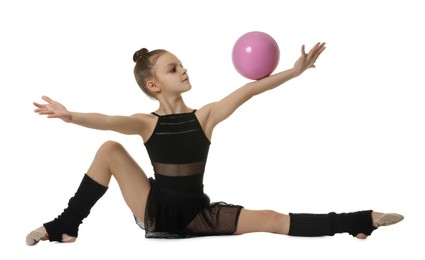 Photo of Cute little gymnast doing with ball on white background