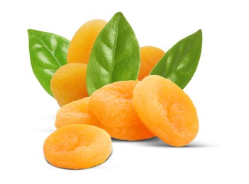 Image of Tasty dried apricots and green leaves on white background