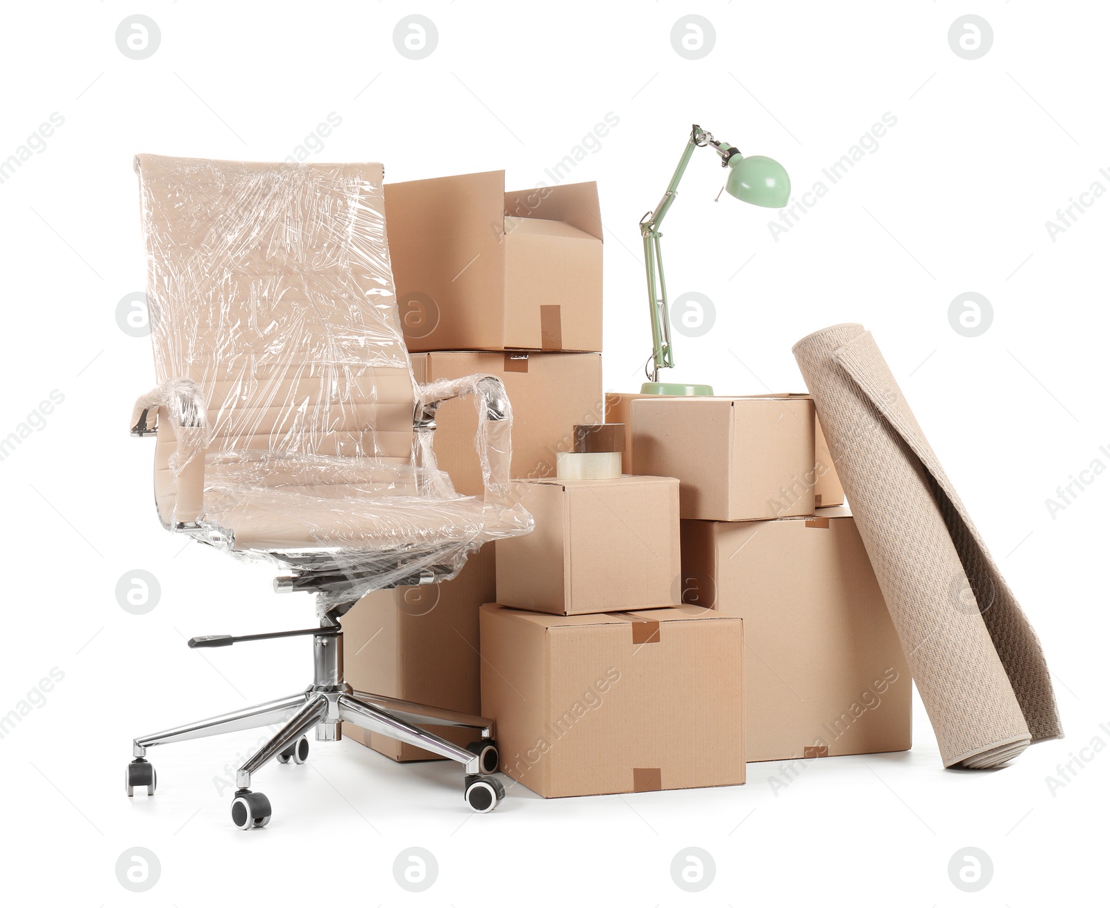 Photo of Cardboard boxes and household stuff on white background. Moving day