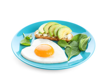 Photo of Plate of tasty breakfast with heart shaped fried egg isolated on white