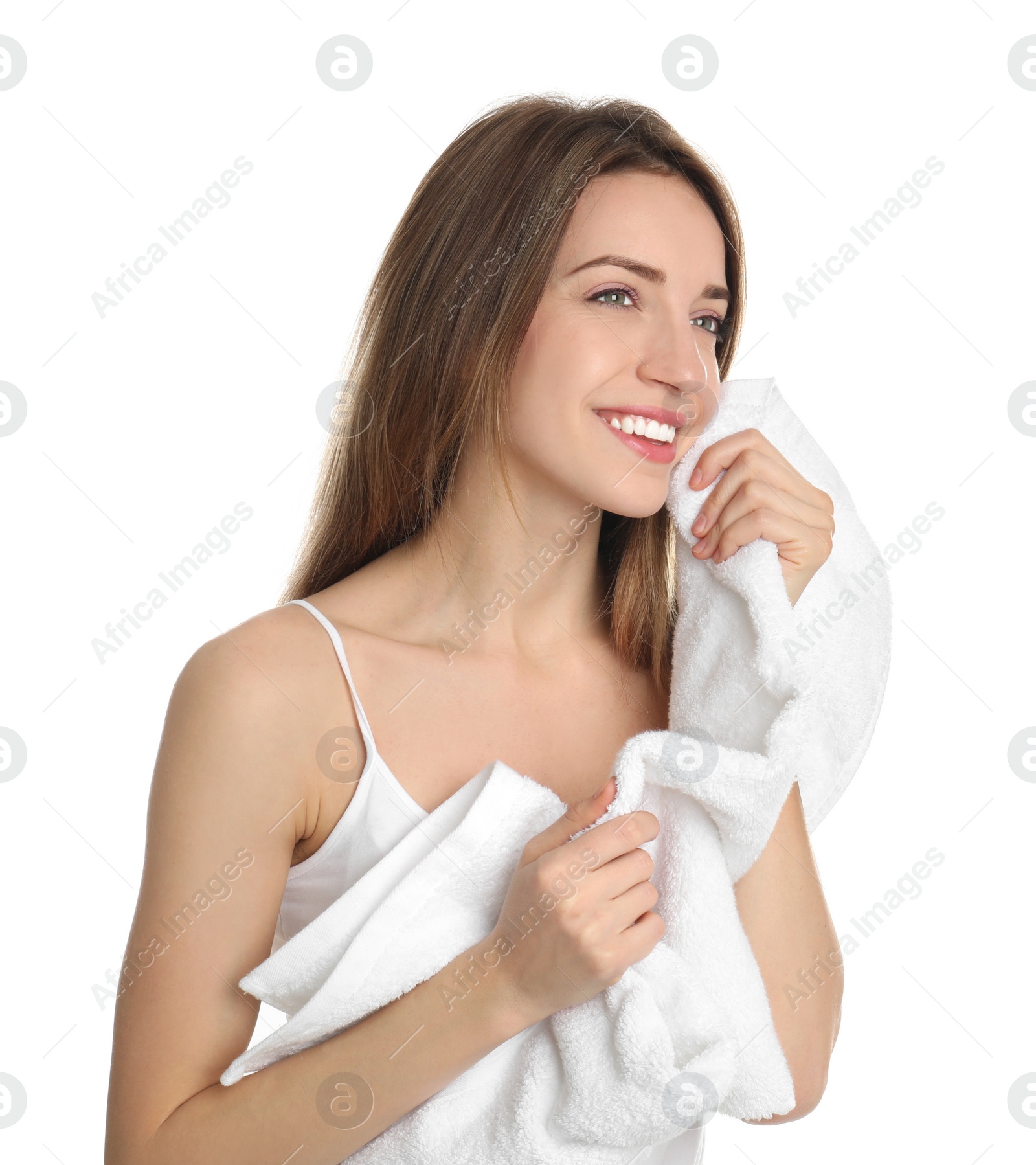 Photo of Young woman wiping face with towel on white background