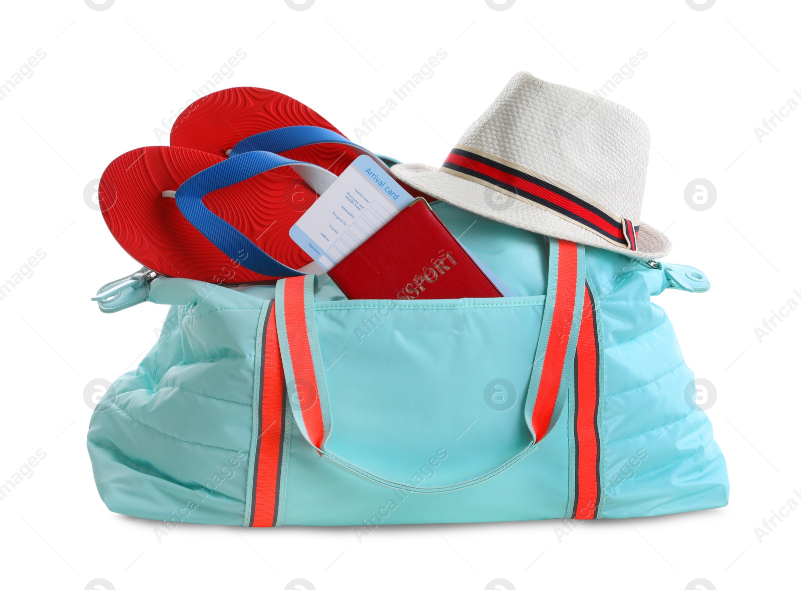 Photo of Stylish bag with hat, flip-flops and passport on white background