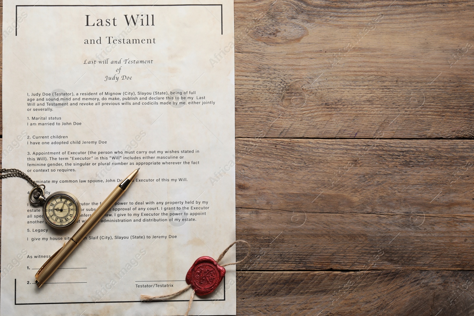 Photo of Last Will and Testament with wax seal, pocket watch and pen on wooden table, top view. Space for text