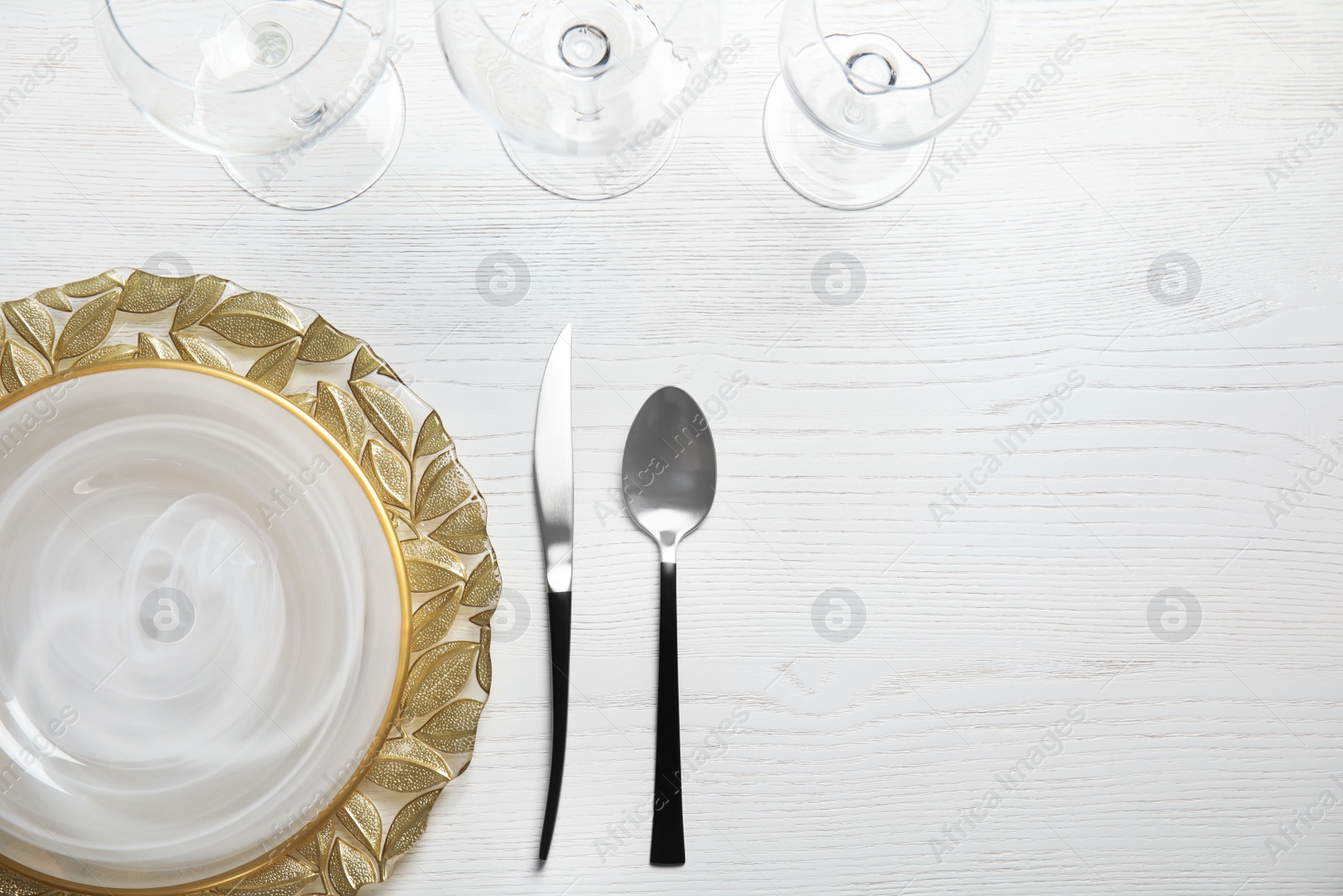 Photo of Elegant table setting with space for text on light background, top view