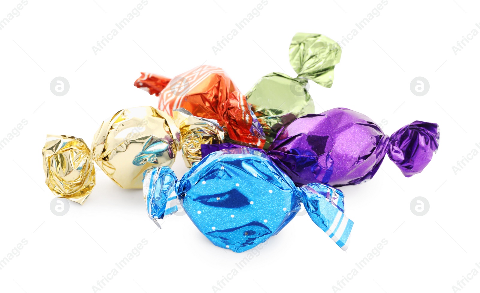 Photo of Sweet candies in colorful wrappers on white background