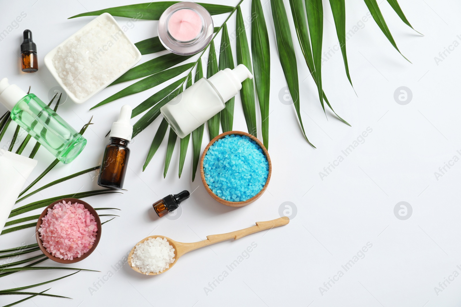 Photo of Flat lay composition with cosmetic products on white background