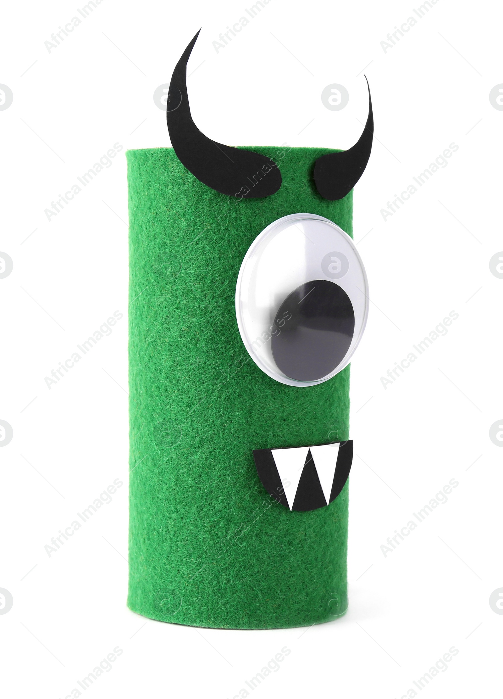 Photo of Monster made of green felt isolated on white. Halloween decoration