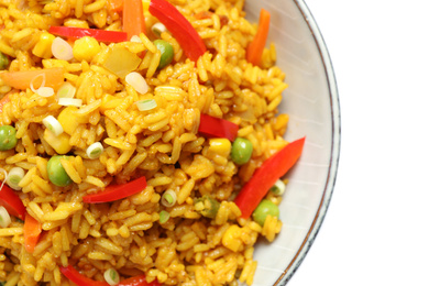 Delicious rice pilaf with vegetables on white background, closeup