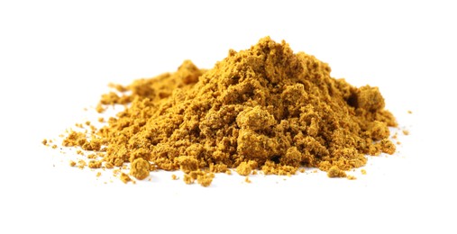 Photo of Pile of dry curry powder isolated on white