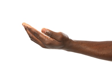 African-American man holding something in hand on white background, closeup