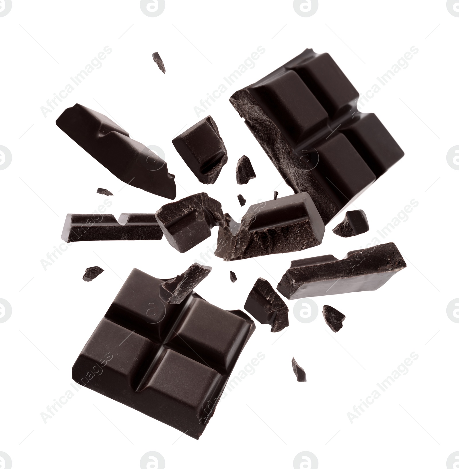 Image of Dark chocolate explosion, pieces shattering on white background