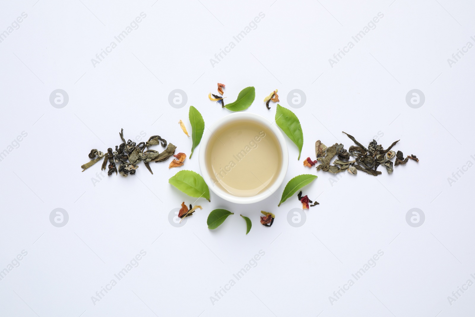 Photo of Flat lay composition with green tea on white background