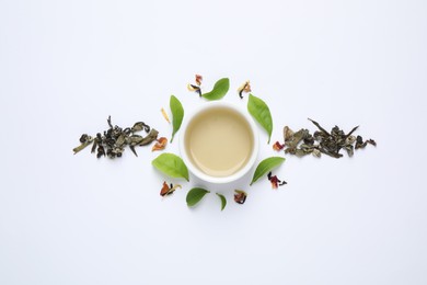 Flat lay composition with green tea on white background