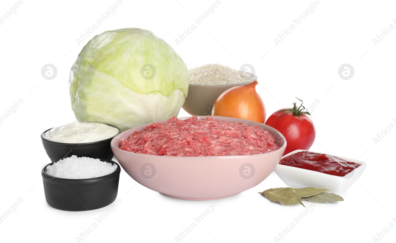 Photo of Set of ingredients for stuffed cabbage rolls on white background