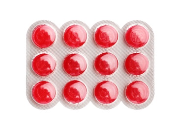 Photo of Pills in blister pack on white background, top view