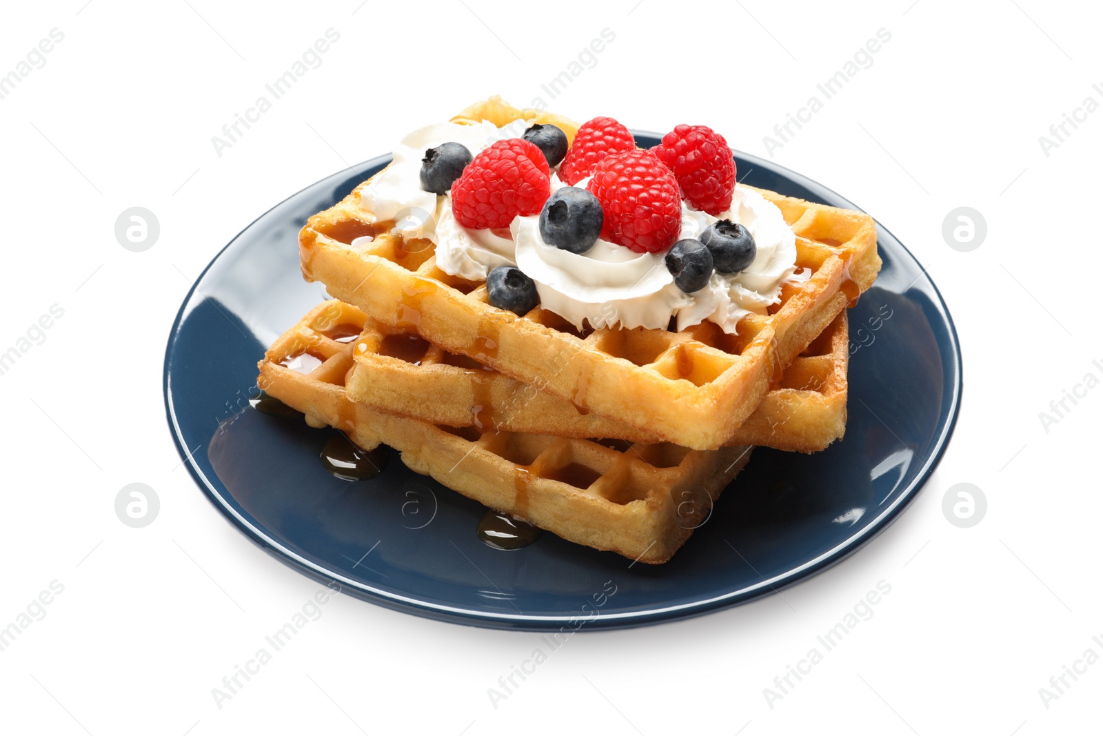 Photo of Plate with yummy waffles, whipped cream and berries on white background