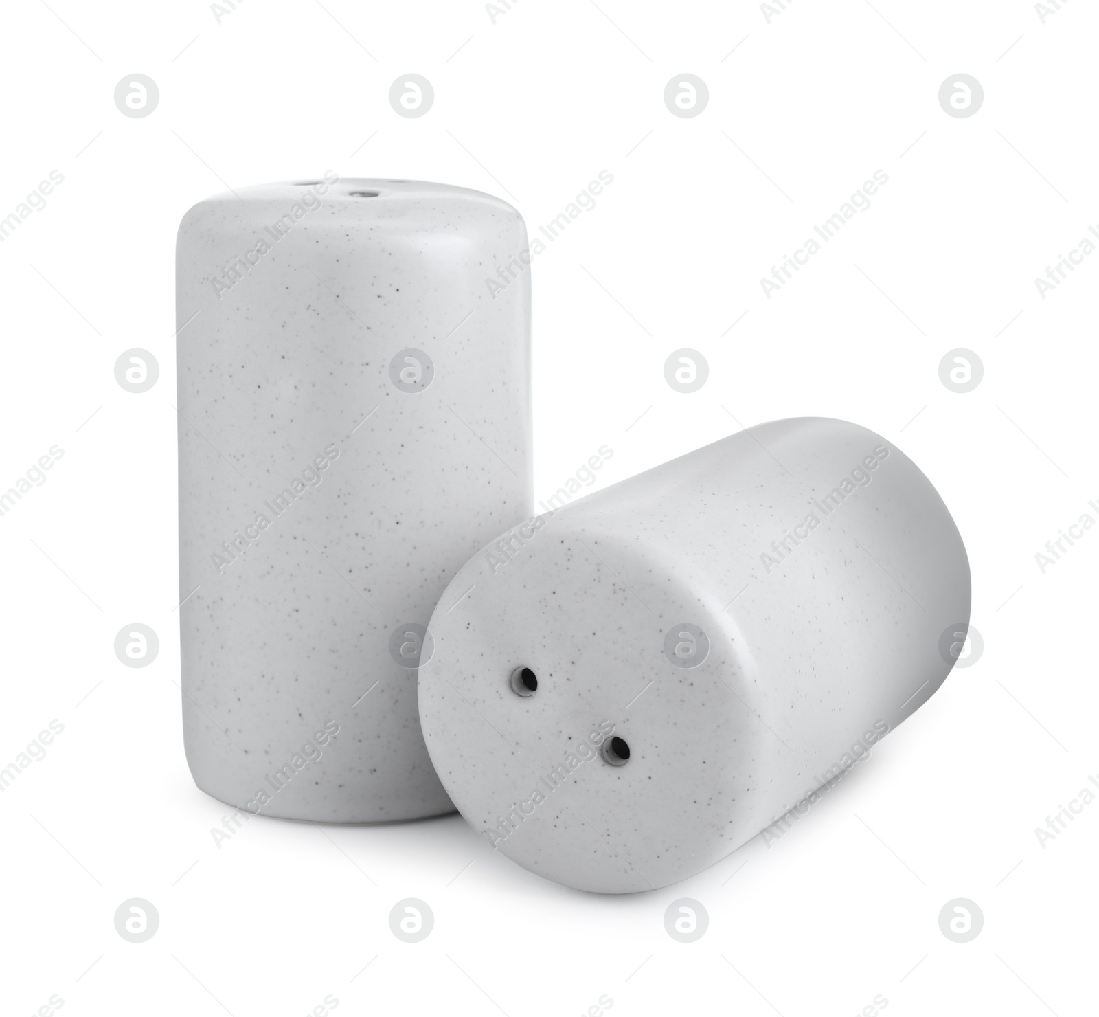 Photo of Salt and pepper shakers isolated on white