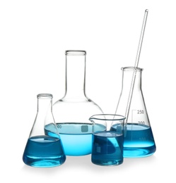 Glassware with blue liquid isolated on white. Laboratory analysis