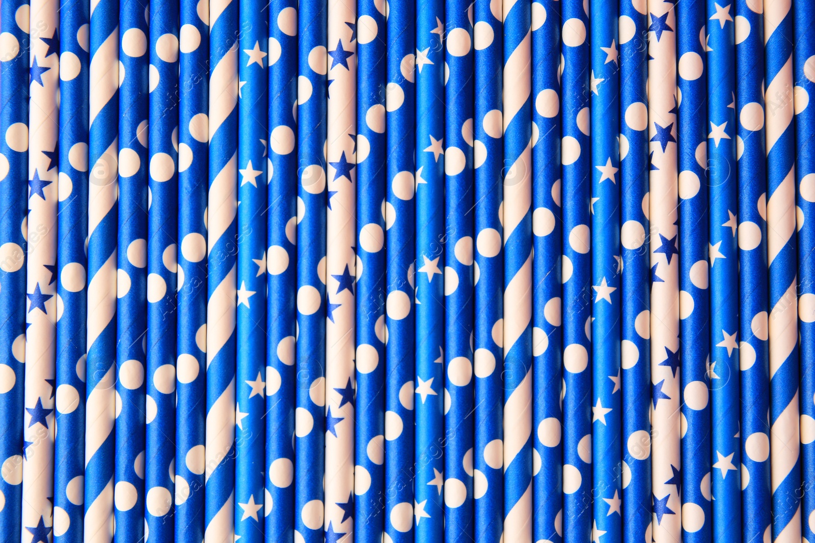 Photo of Many paper drinking straws as background, top view