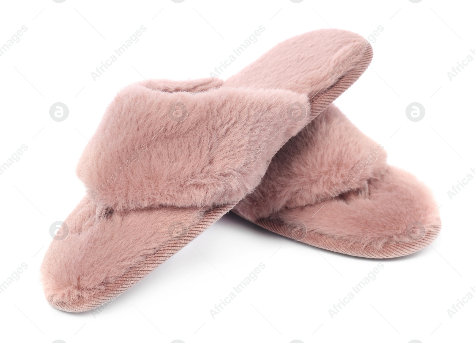 Photo of Pair of pink soft slippers isolated on white