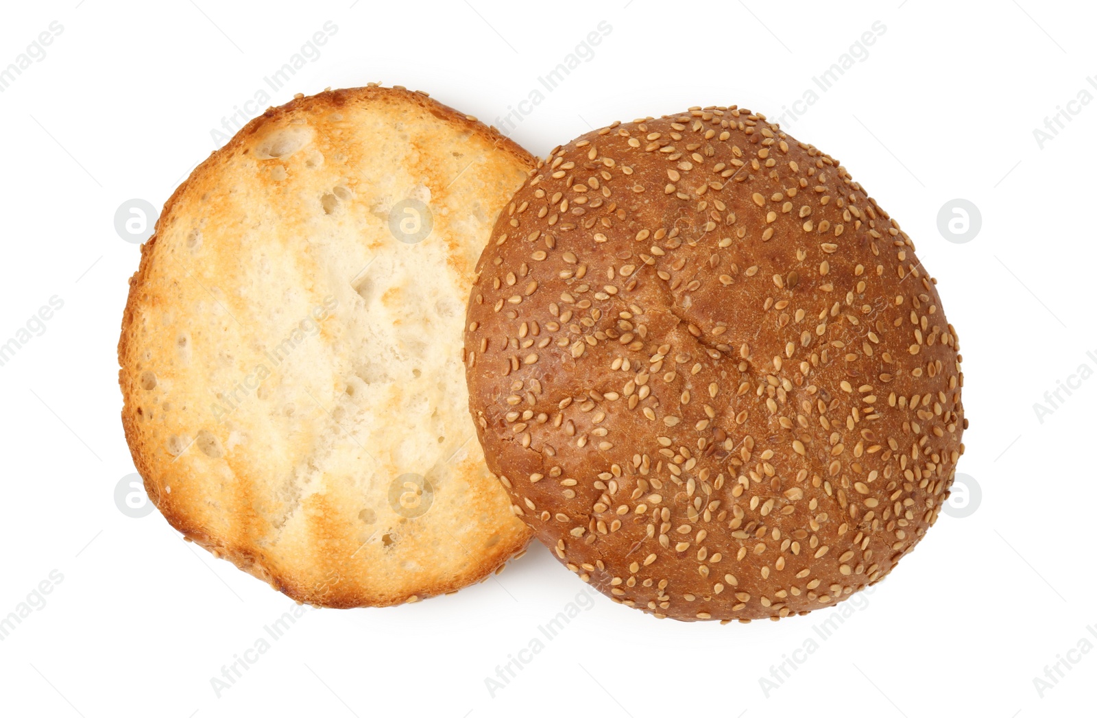 Photo of Halves of grilled burger bun isolated on white, top view