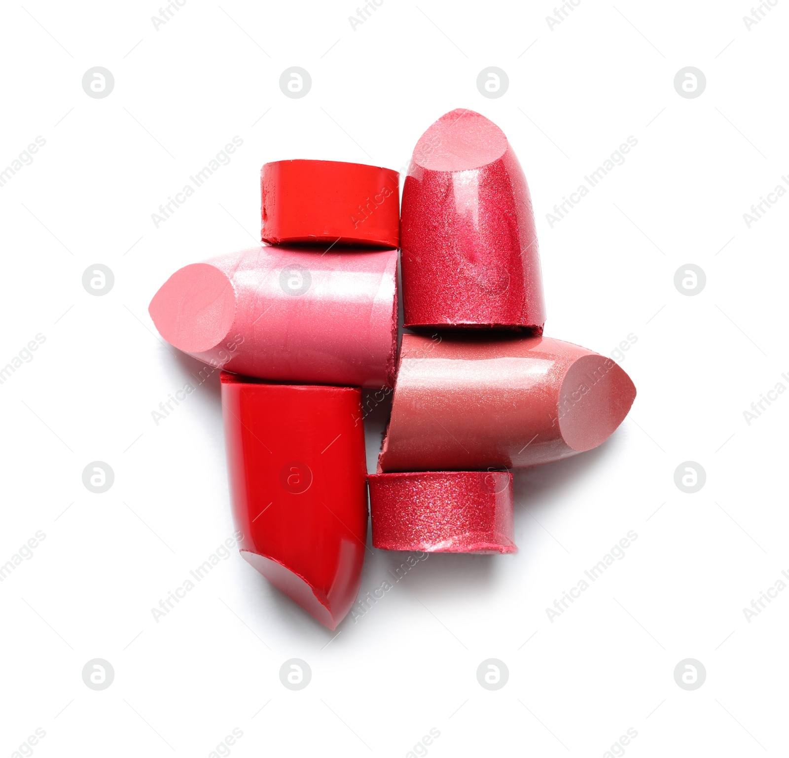 Photo of Different lipstick swatches on white background, top view