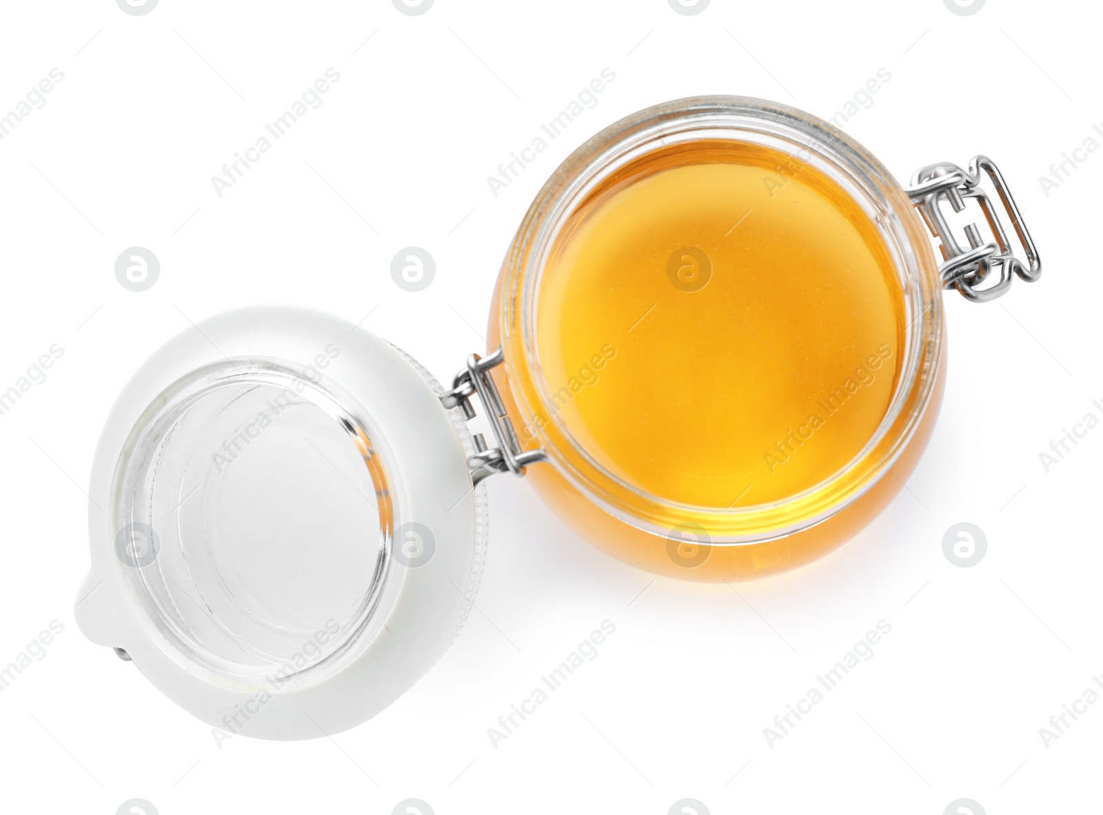Photo of Jar of organic honey isolated on white, top view