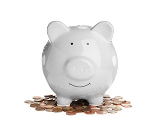 Piggy bank with coins on white background