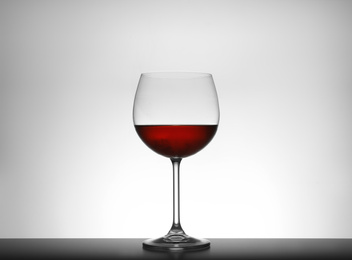 Glass of red wine isolated on white