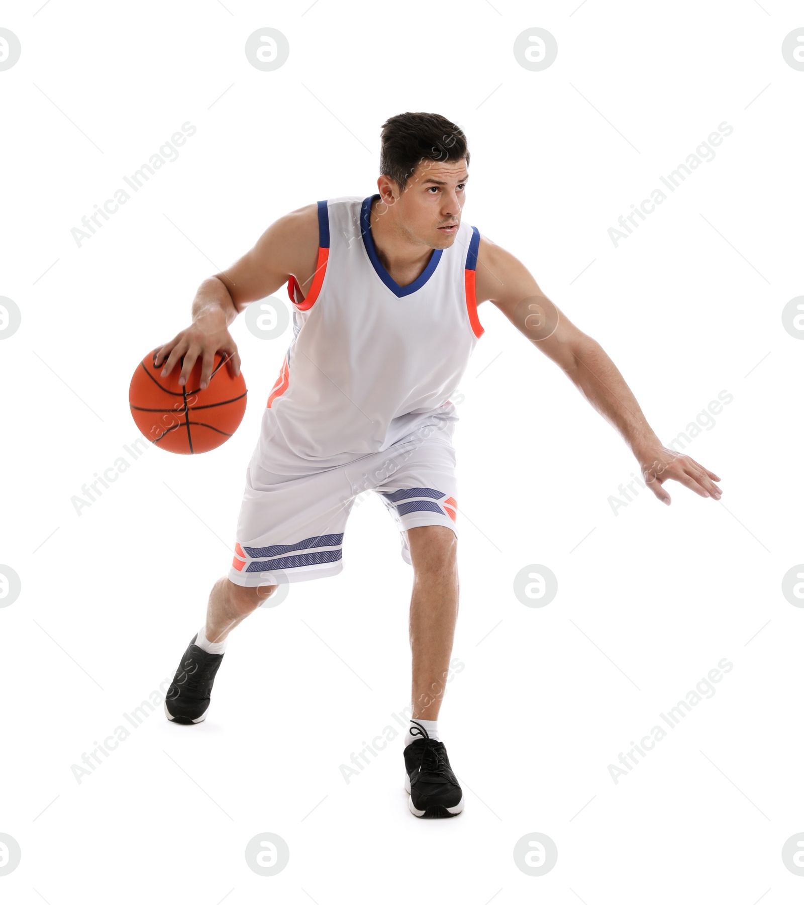 Photo of Professional sportsman playing basketball on white background