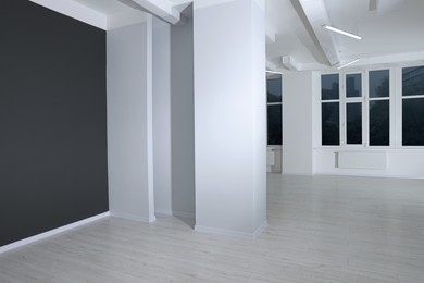 Photo of New empty room with clean windows and light walls