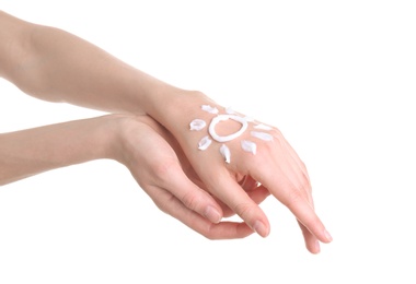 Photo of Young woman applying hand cream against on white background