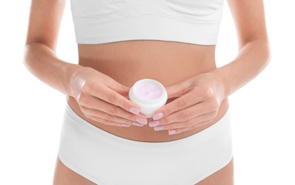 Young woman with jar of cream on white background, closeup. Beauty and body care