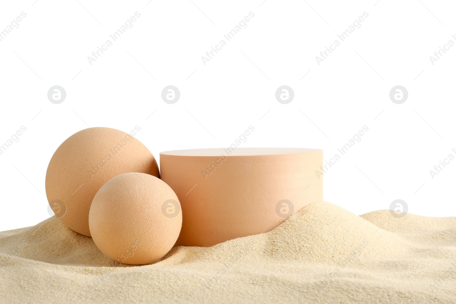 Photo of Presentation of product. Different podiums on sand against white background