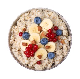 Photo of Ceramic bowl with oatmeal, berries and banana slices isolated on white, top view