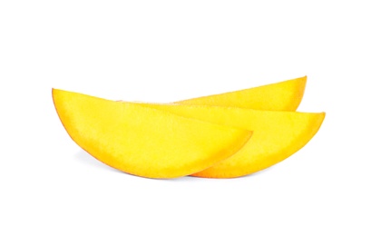 Juicy mango slices on white background. Tropical fruit