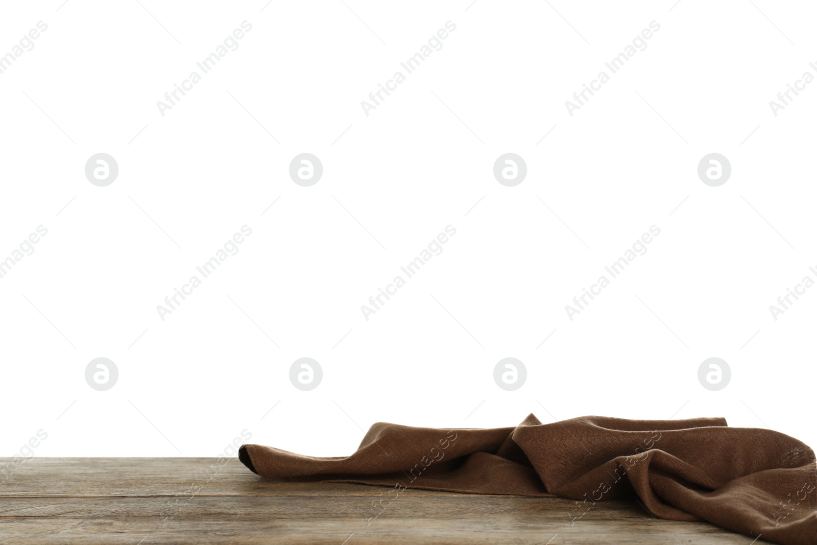 Photo of Crumpled napkin on table against white background